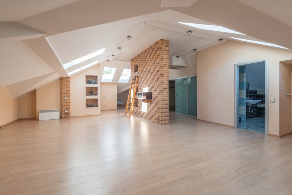 pexels-photo-8082324 New construction attic space that has been fully updated with new flooring, lights, and contempory designs